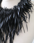bold, chunky black statement necklace made out of recycled upcycled bike tyre rubber inner tube by Laura Zabo, bib necklace