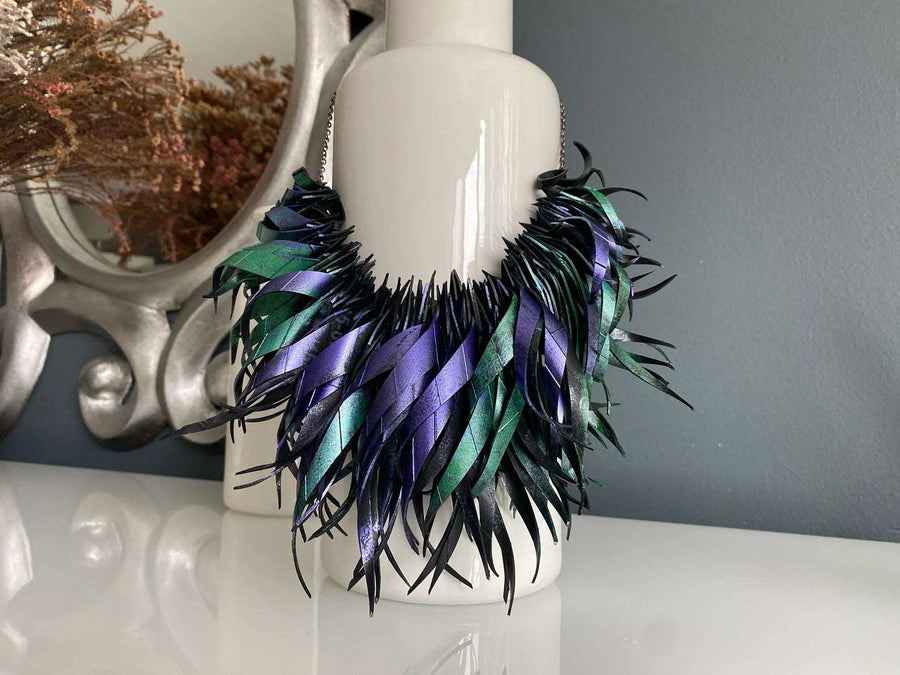 large peacock coloured, purple green upcycled bike inner tube statement necklace by Laura Zabo