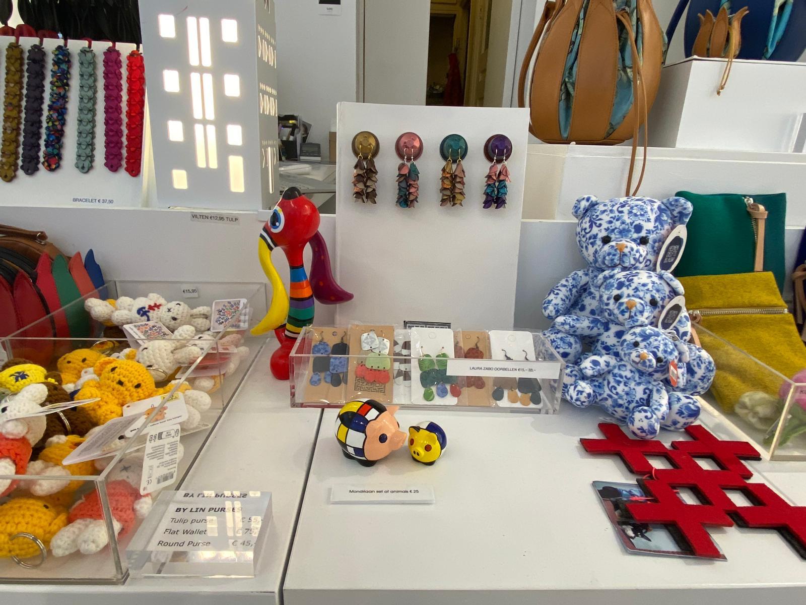 Display of various designer decorations, toys and decorative items on a table