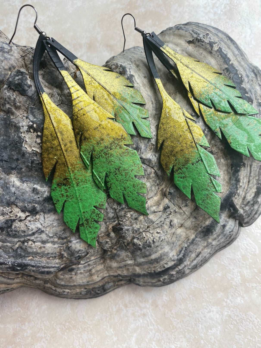 green gold leaf shaped earrings, upcycled tyre rubber earrings by Laura Zabo, sustainable and eco-friendly gift