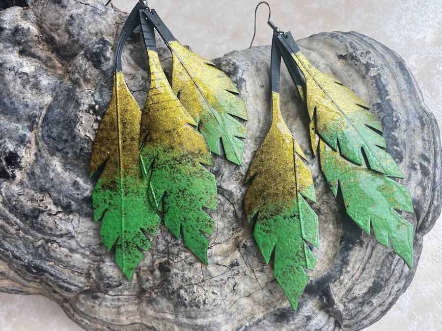 green gold leaf shaped earrings, upcycled tyre rubber earrings by Laura Zabo, sustainable and eco-friendly gift