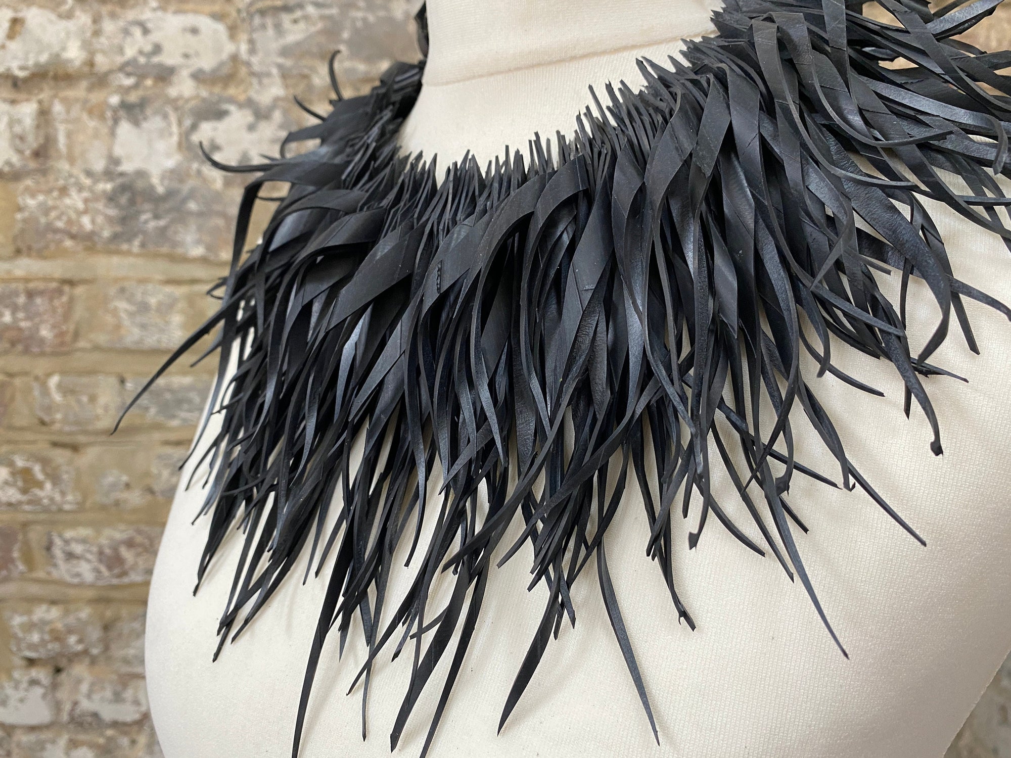bold, avantgarde, black upcycled bicycle inner tube statement necklace by laura zabo