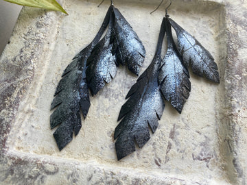 silver black leaf shaped bold long statement earrings, upcycled tyre rubber jewelry, eco-friendly Christmas and birthday gift by Laura zabo