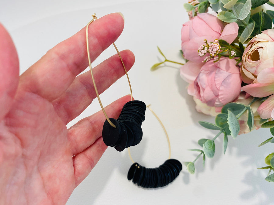 golden black hoop earrings, upcycled bicycle inner tube tyre rubber jewellery, vegan and eco-friendly gift by Laura Zabo