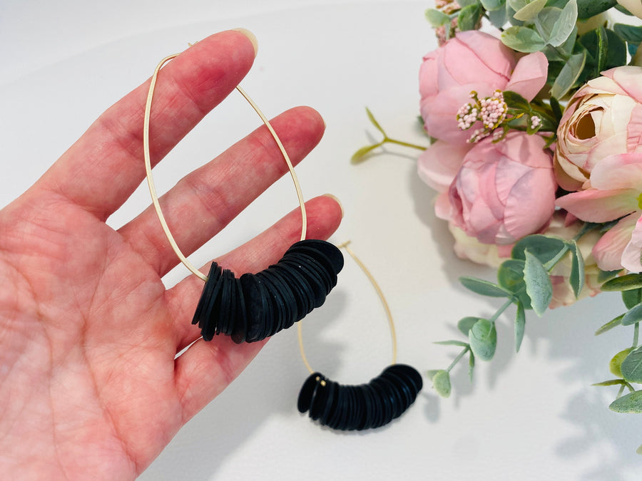 golden black hoop earrings, upcycled bicycle inner tube tyre rubber jewellery, vegan and eco-friendly gift by Laura Zabo