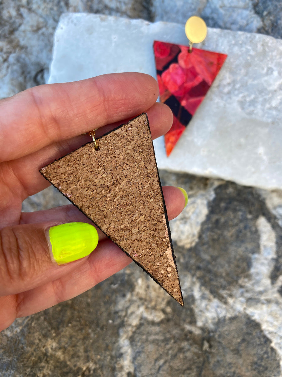 large red black triangle shaped earrings on rocks made from upcycled bicycle inner tubes from Laura Zabo.