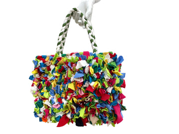 colourful upcycled fabric woven bag, eco friendly and sustainable bag on white background