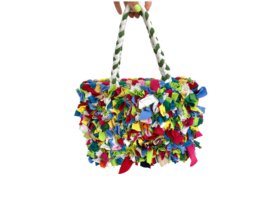 colourful upcycled fabric woven bag, eco friendly and sustainable bag on white background