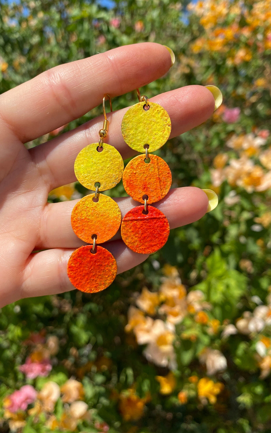 sunrise themed polka dot shaped upcycled bicycle inner tube earrings