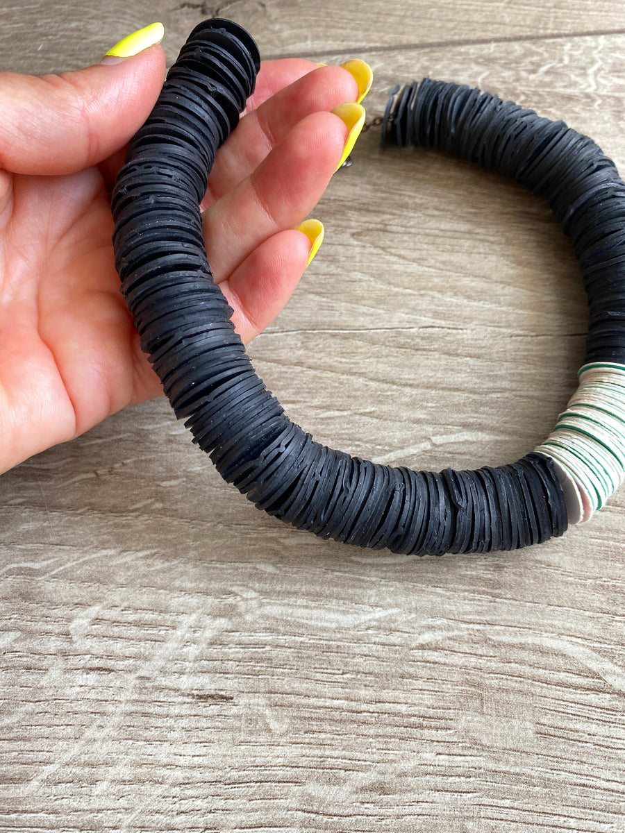 black white African tribal necklace made from upcycled bicycle inner tubes, tyre rubber and paper circles