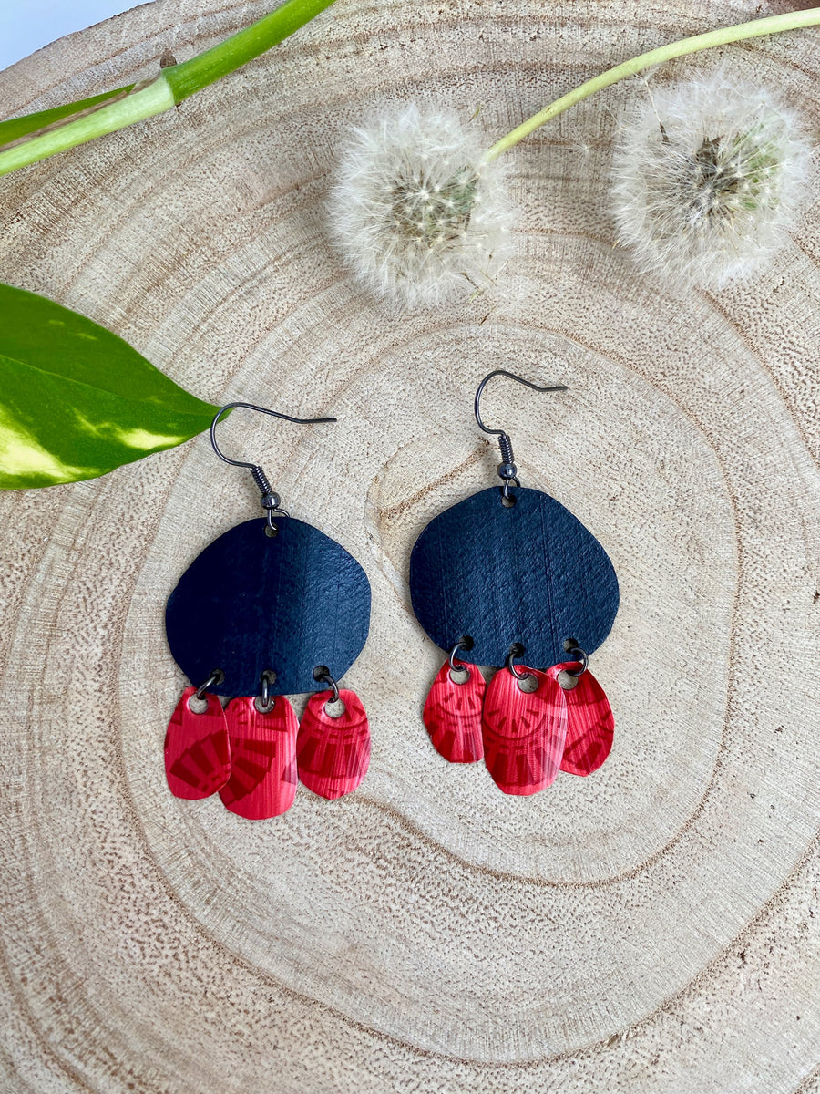 Bohemian, red black upcycled bike inner tube and Nespresso pod earrings on a wooden background