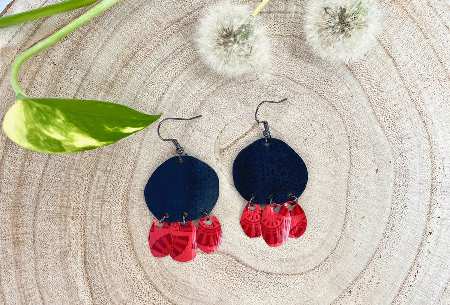 Bohemian, red black upcycled bike inner tube and Nespresso pod earrings on a wooden background