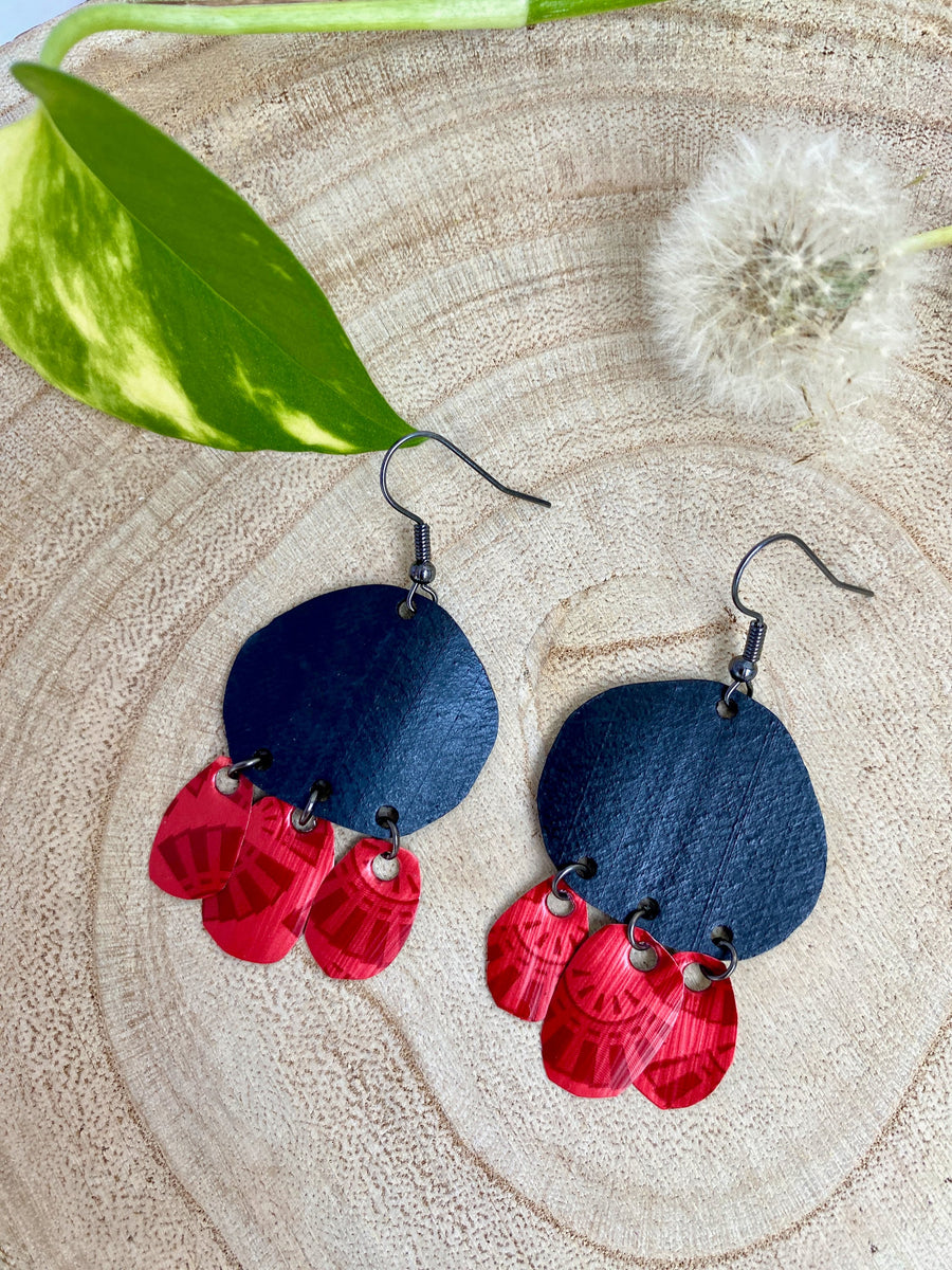 Bohemian, red black upcycled bike inner tube and Nespresso pod earrings on a wooden background