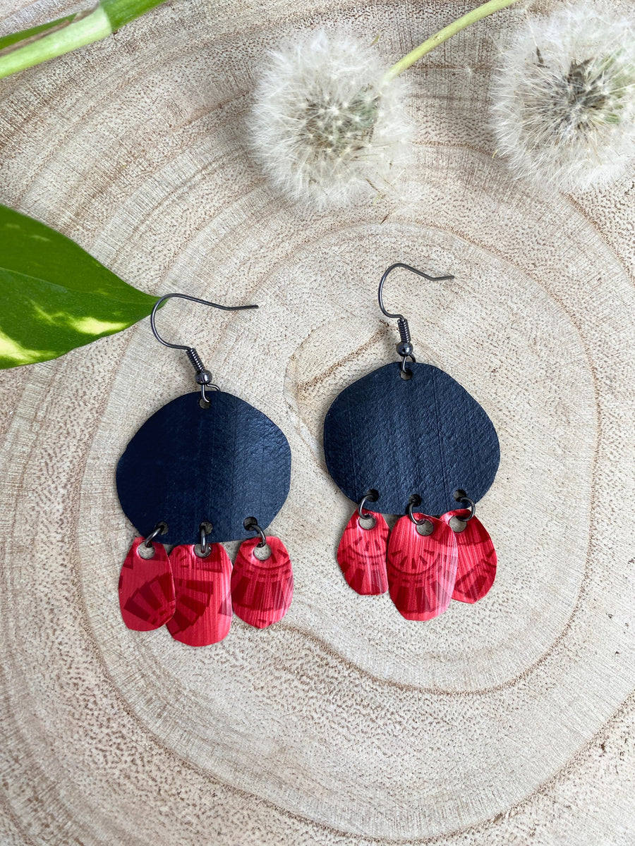 Bohemian, red black upcycled bike inner tube and Nespresso pod earrings on a wooden background