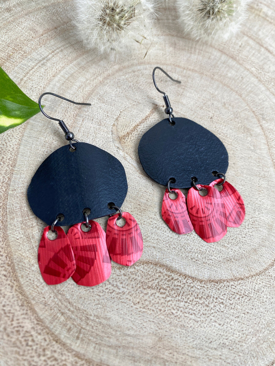 Bohemian, red black upcycled bike inner tube and Nespresso pod earrings on a wooden background