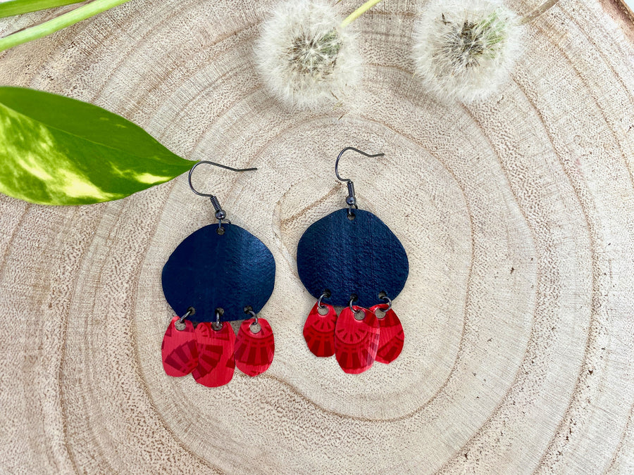 Bohemian, red black upcycled bike inner tube and Nespresso pod earrings on a wooden background