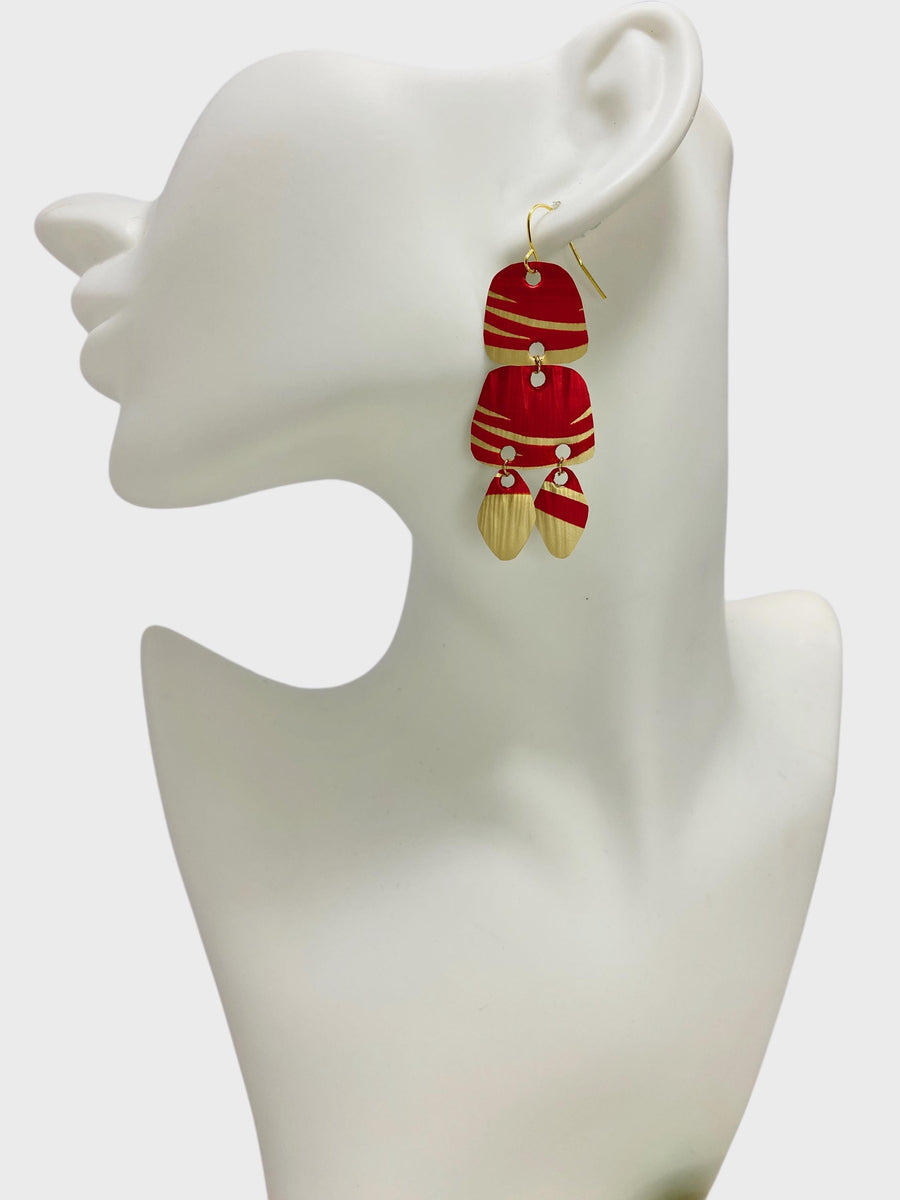 Upcycled golden - red Nespresso capsules earrings on whitehead mannequin