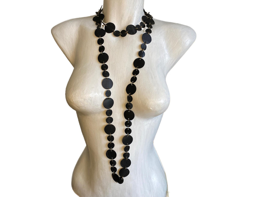 upcycled bicycle inner tube necklace, long, black wrap necklace on a white mannequin