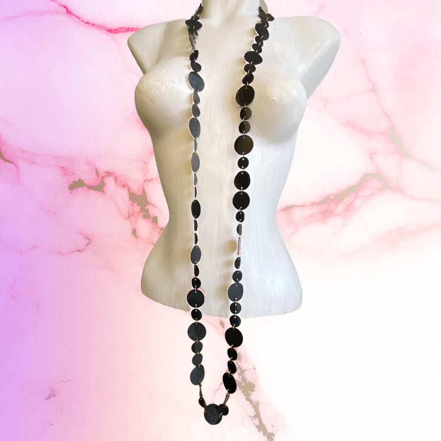 upcycled bicycle inner tube necklace, long, black wrap necklace on a white mannequin