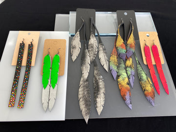 5 pairs of long, colourful upcycled bicycle inner tube earrings made by laura zabo