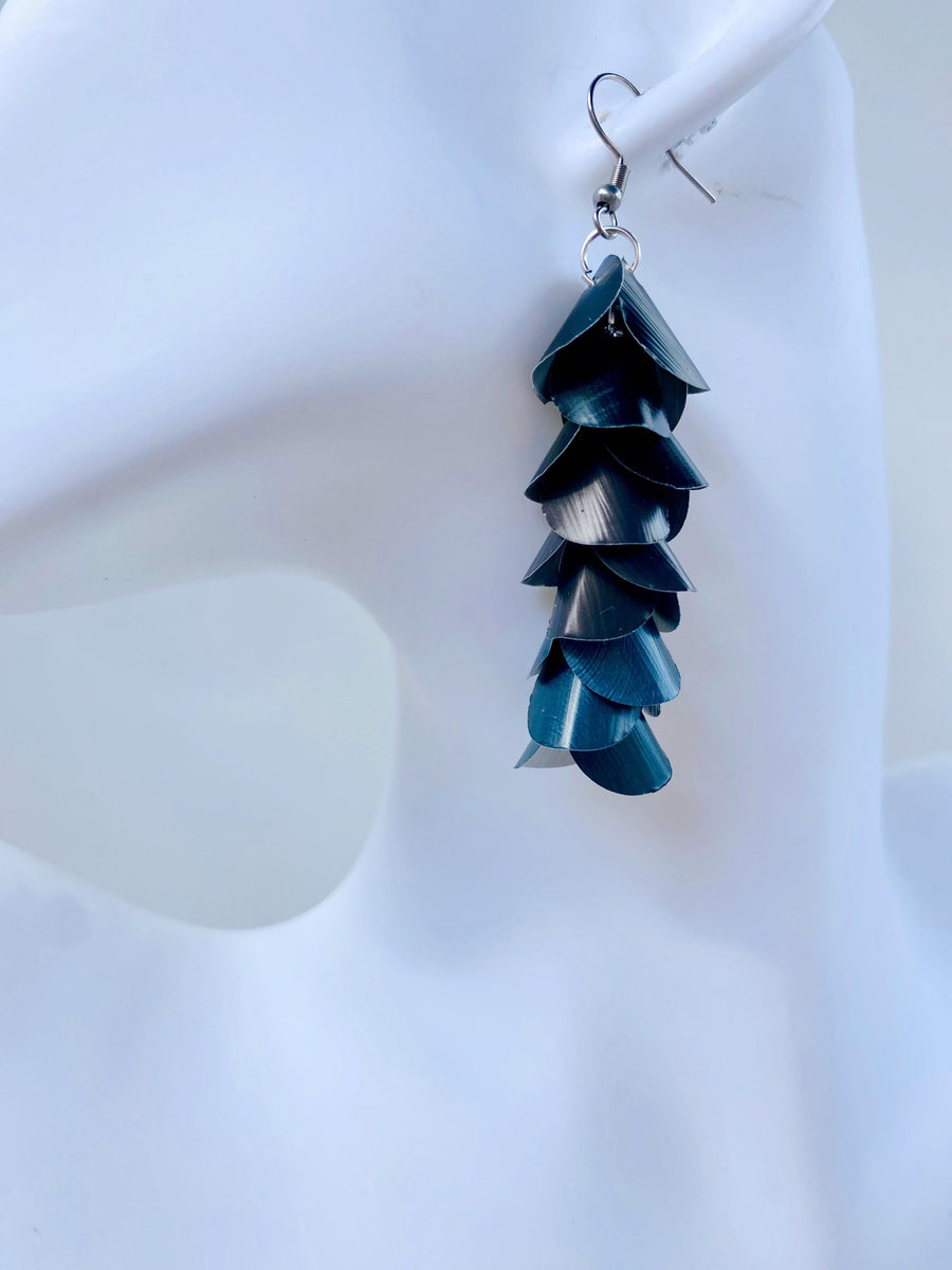 black grey cascading earrings made from upcycled nespresso pods on a white mannequin head