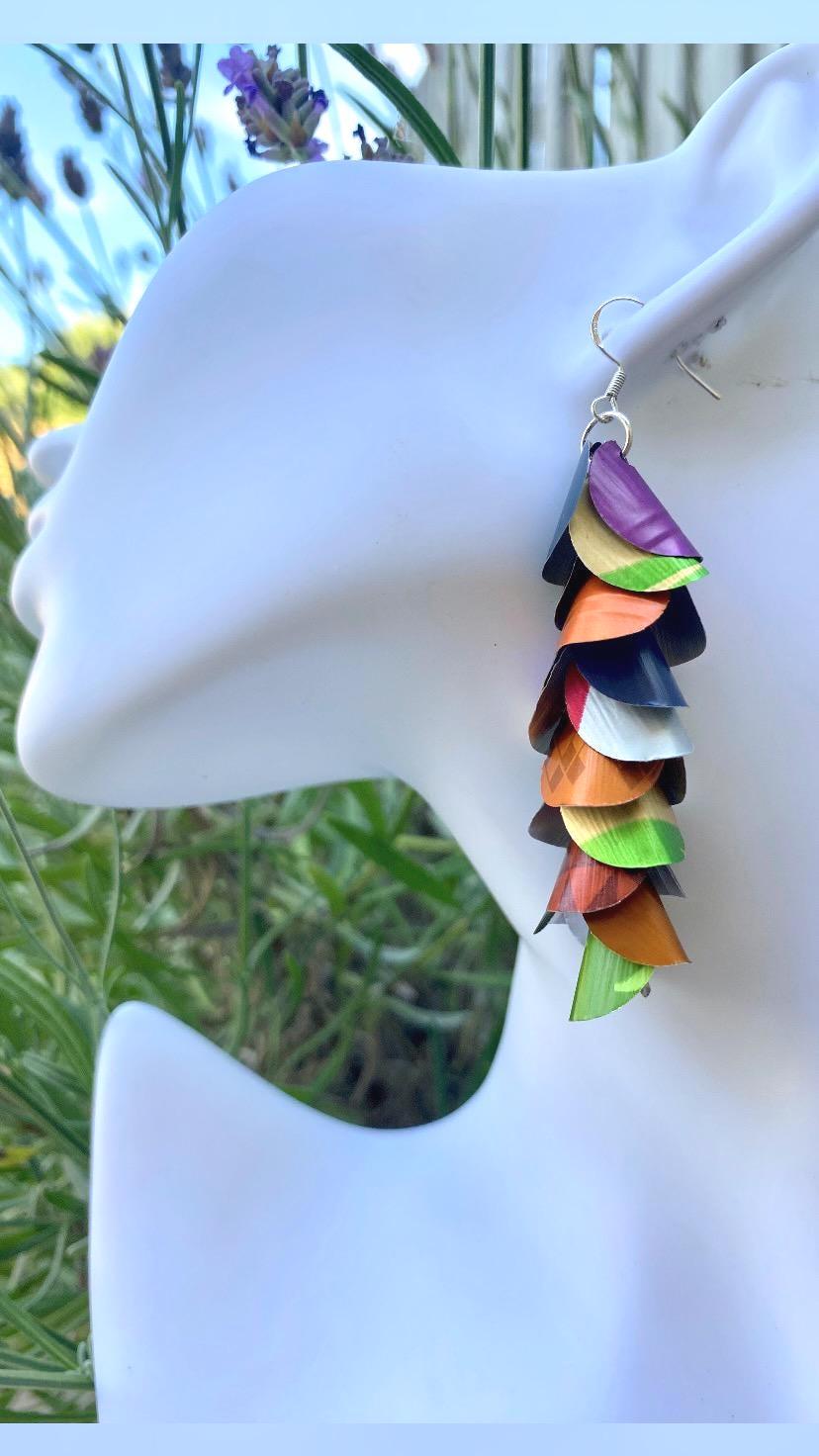 multicoloured, lightweight, summer earrings made from upcycled nespresso capsules on a white mannequin head