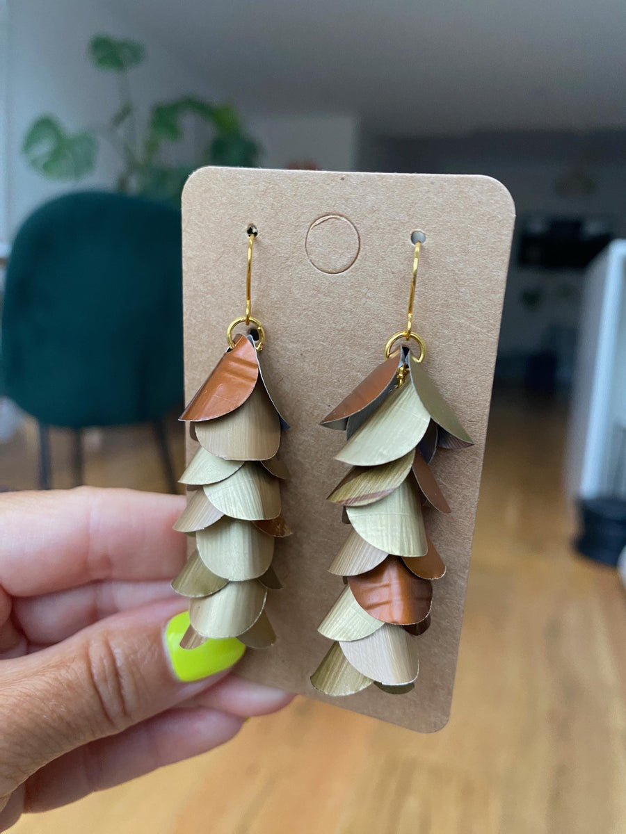 gold bronze cascading earrings made from upcycled nespresso pods, capsules on a paper display