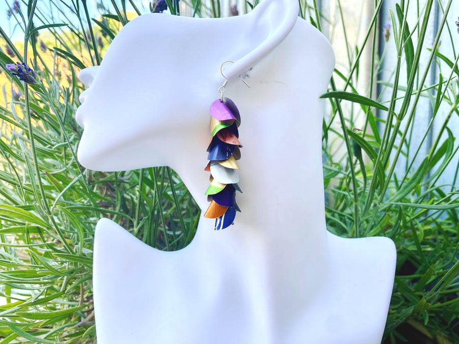 multicoloured, lightweight, summer earrings made from upcycled nespresso capsules on a white mannequin head