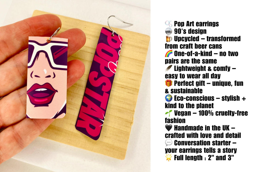 asymmetric, 90's Pop-art earrings featuring POPSTAR text and women's face made from  an upcycled craft beer can on a wooden and white background with description