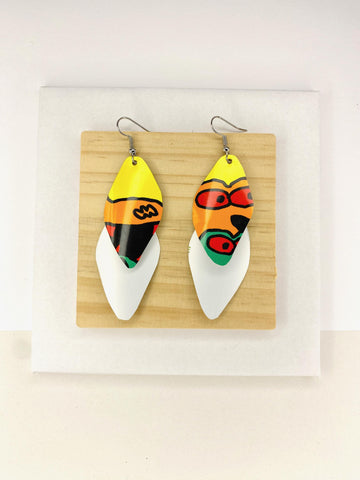 colourful cascade earrings made from upcycled craft beer cans on a wooden and white background