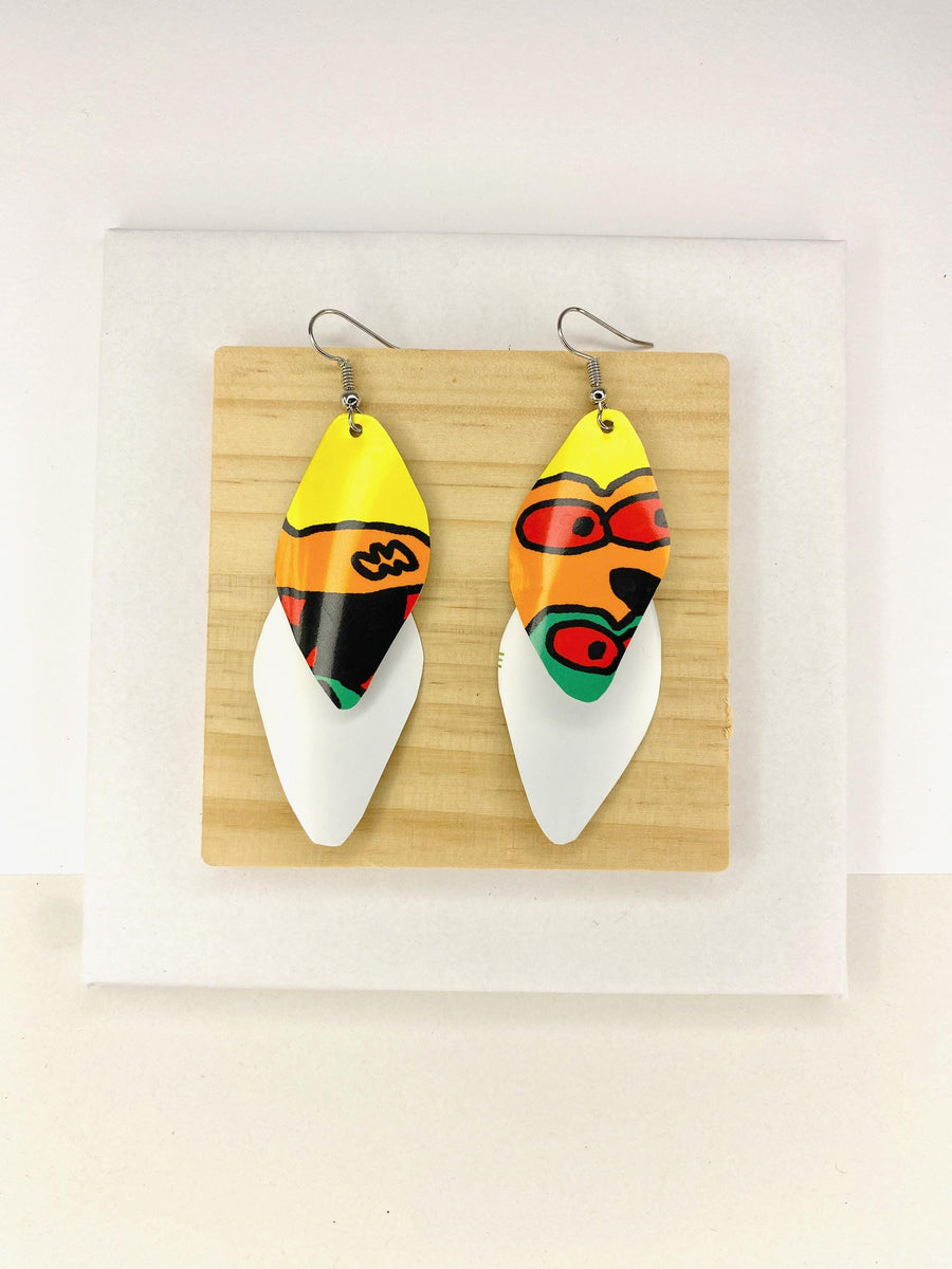 colourful cascade earrings made from upcycled craft beer cans on a wooden and white background