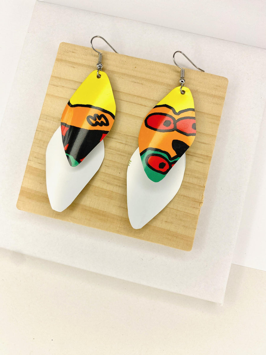 colourful cascade earrings made from upcycled craft beer cans on a wooden and white background